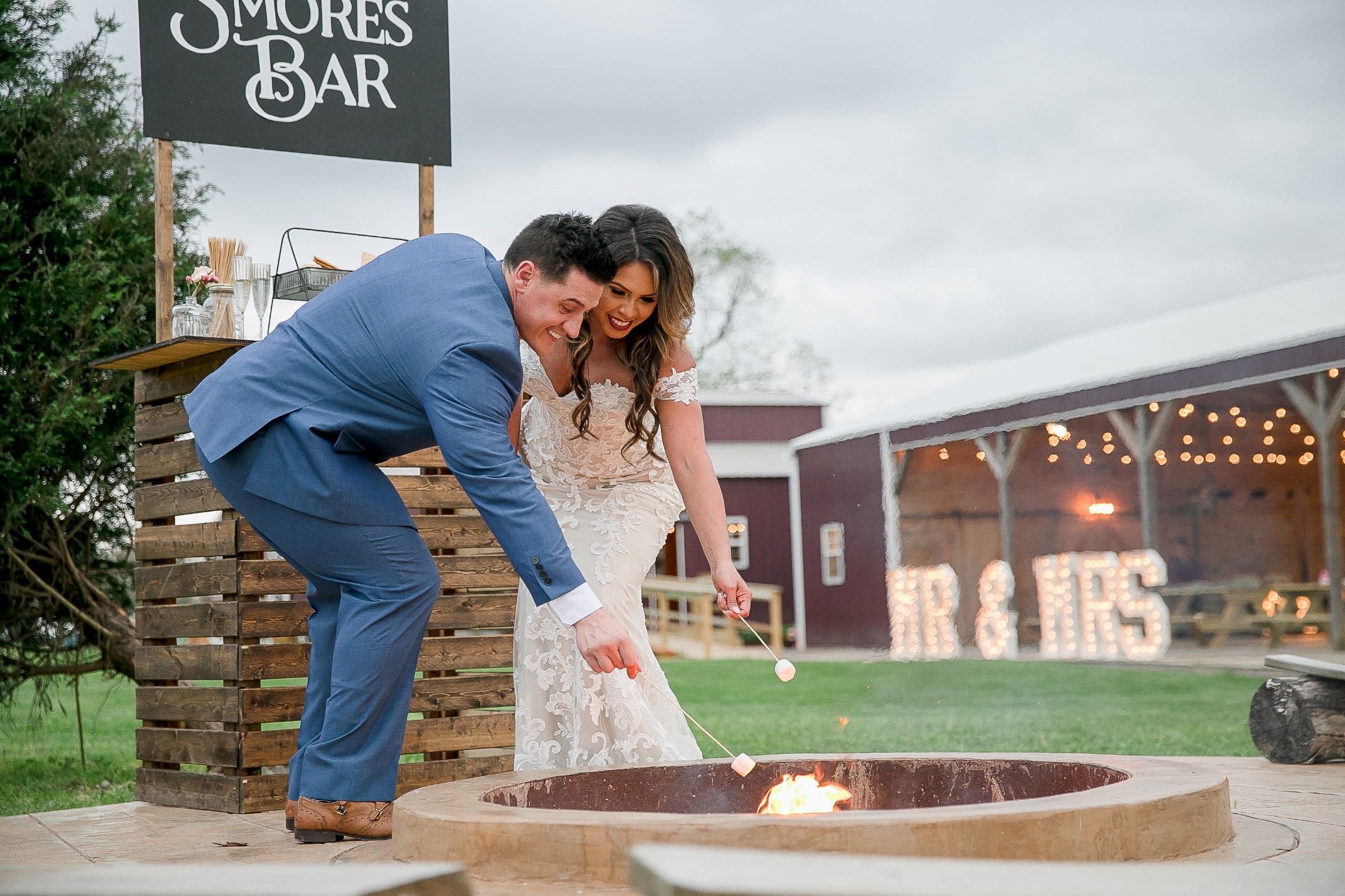 outdoor wedding couple fire